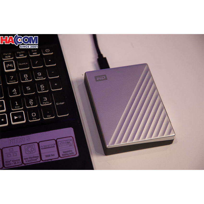 58717_o_cung_gan_ngoai_wd_my_passport_ultra_vang_4tb_mau__2_5_quot_wdbftm0040bsl_wesn__3_.jpg 7